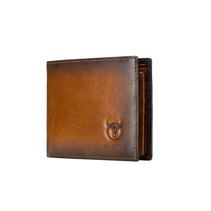 Genuine leather tan bi-fold wallet in closed position showing bull horn logo