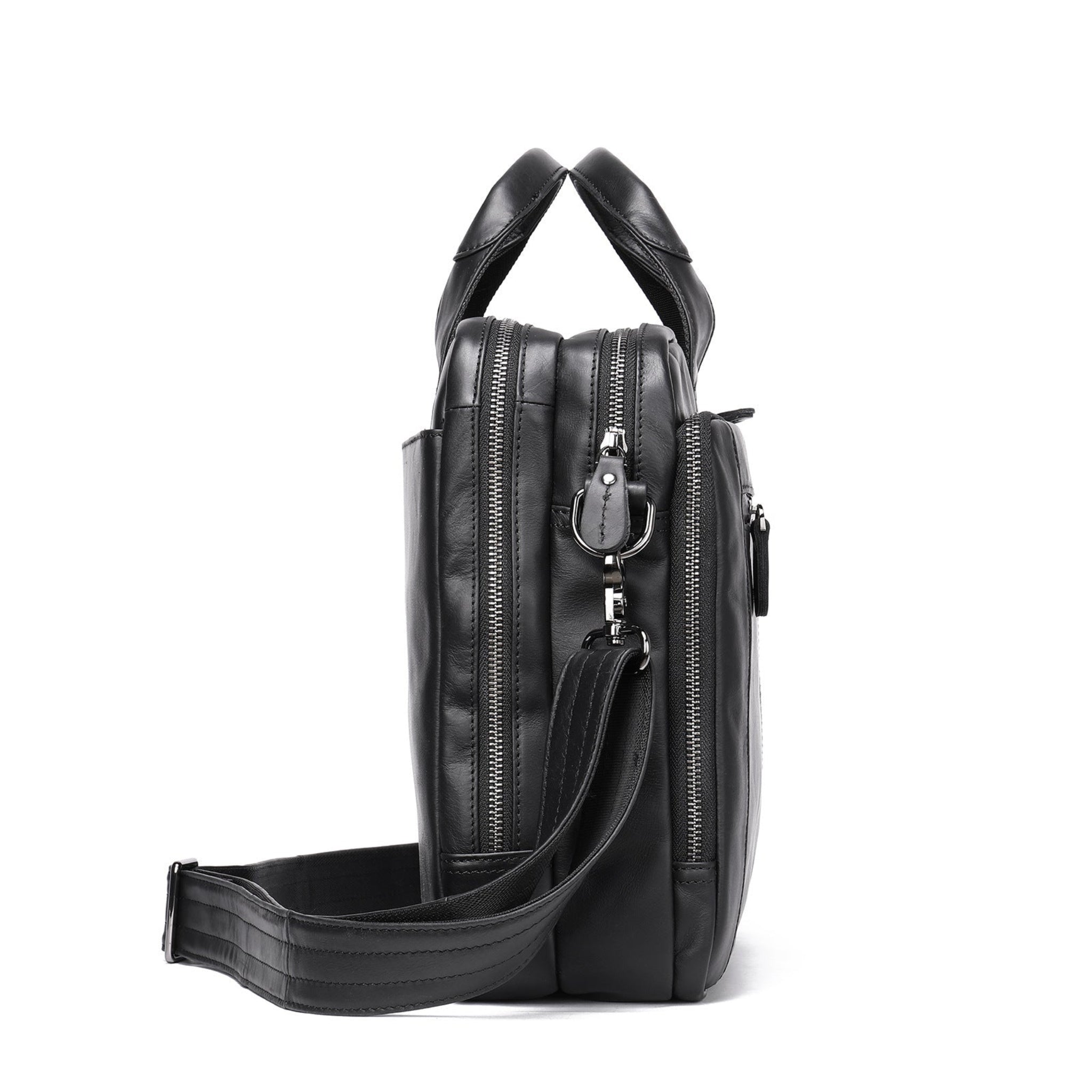 Black leather bag with multiple zippers on a white background