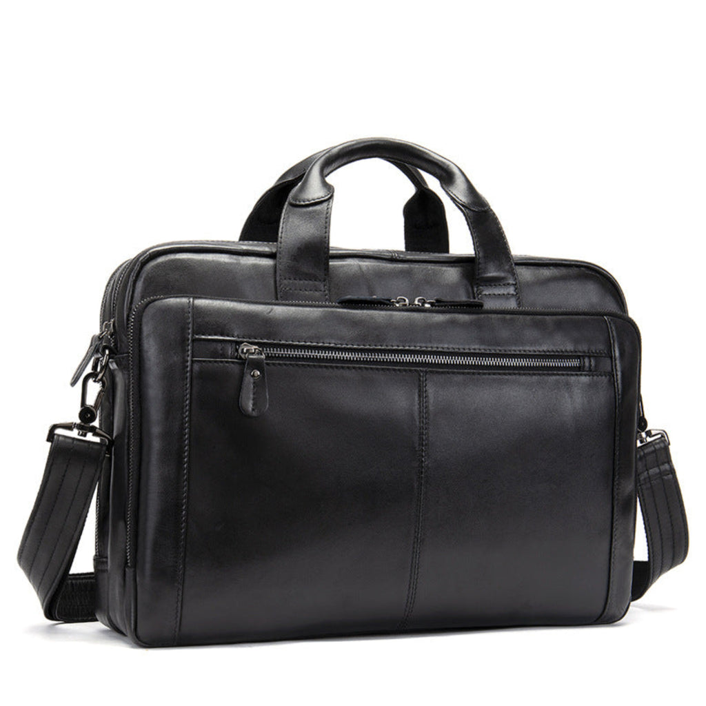 Black leather briefcase with multiple zippers on a white background