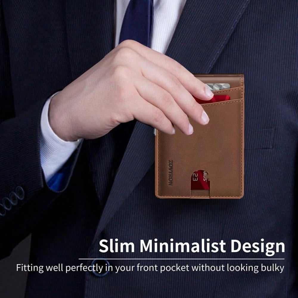 Person wearing a suit with a slim minimalist brown wallet in front pocket